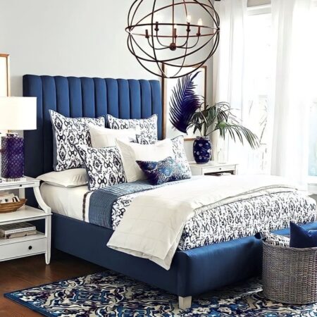 Tubes Panel Bed upholstered in Blue Plush Velvet fabric.